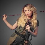 Lindsey Stirling Electronic musician, holding a violin - My Christian Musician