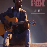 Gospel and Contemporary Christian Musician, Travis Greene's song Made A Way - cover depicts Travis Greene sitting and playing guitar