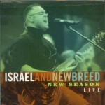 Contemporary Christian Musician Israel Houghton singing and playing a guitar on cover of New Season Lite Album