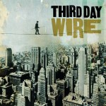 Third Day, Christian Rock Band, Wire album cover shows a man walking across a tightrope, skyscrapers in the background - My Christian Musician