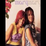 Erica and Tina Campbell of Mary Mary smiling while sitting - My Christian Musician