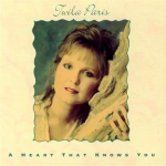 Twila Paris leaning her head to an object as a cover photo for her song, "A Heart That Knows You" - My Christian Musician