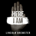 Palm with a text on the foreground that displays "HERE I AM" and "LINCOLN BREWSTER", on a black background - My Christian Musician