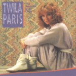 Twila Paris wearing a white boots, sitting - My Christian Musician