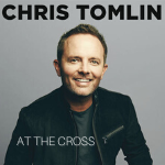 Chris Tomlin smiling at the camera, cover art for his song "At The Cross" - My Christian Musician