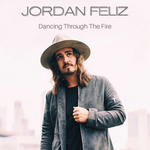 Portrait of Jordan Feliz wearing a hat and a gray jacket, cover art for his song "Dancing Through The Fire" - My Christian Musician