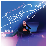 Tasha Cobbs Leonard singing "Jesus Saves" onstage - My Christian Musician