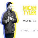 Micah Tyler looking sideways as a cover art for his song Walking Free - My Christian Musician